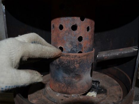 Un four en état de marche avec un circuit d'eau: le principe de fonctionnement d'une chaudière, un four à huile usée, des dessins d'un four avec une chemise d'eau, comment le faire vous-même